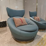 Dusty Blue Leather Lounge Chair with Elevated Headrest and High-Gloss Dark Back Panel